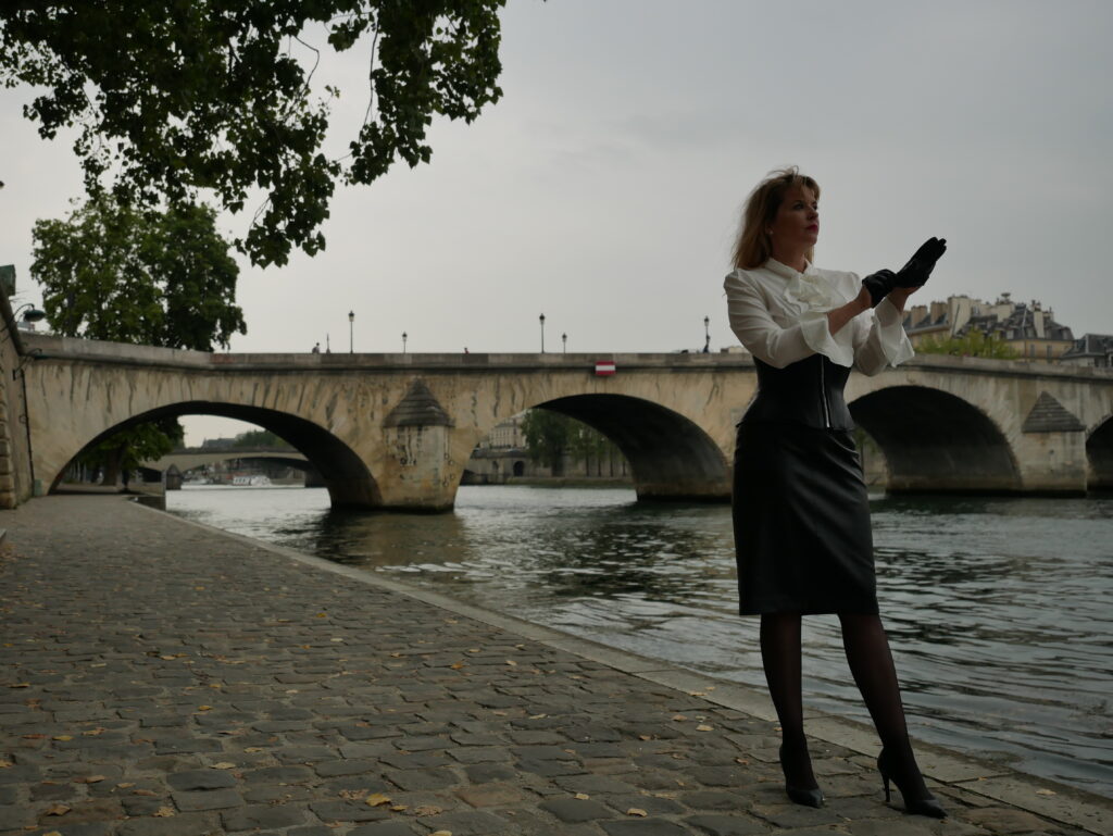 Domina M on the Seine Domina M guides her femdom newbies eleegantly clad in leather and silks